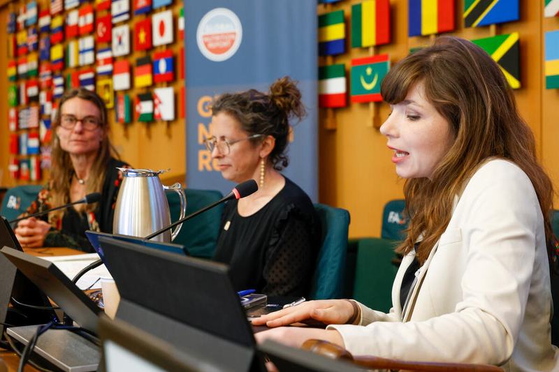 Theresa Herbold (right), Senior Policy Advisor at the German Federal Ministry for Economic Cooperation and Development, moderates a panel discussion on the policy and systems implications of the report's findings. Photo: ©FAO/Pier Paolo Cito